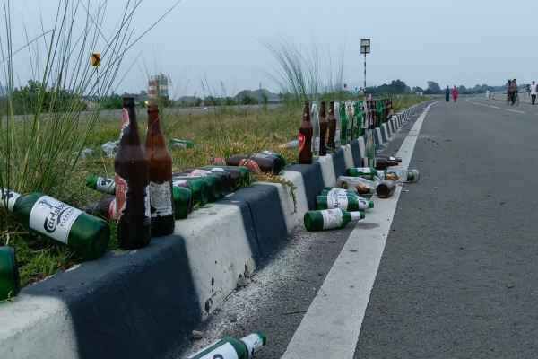 Saraikela: Pile of beer bottles on Chandil NH-32 bypass; roadside turns into a haunt for drinkers.